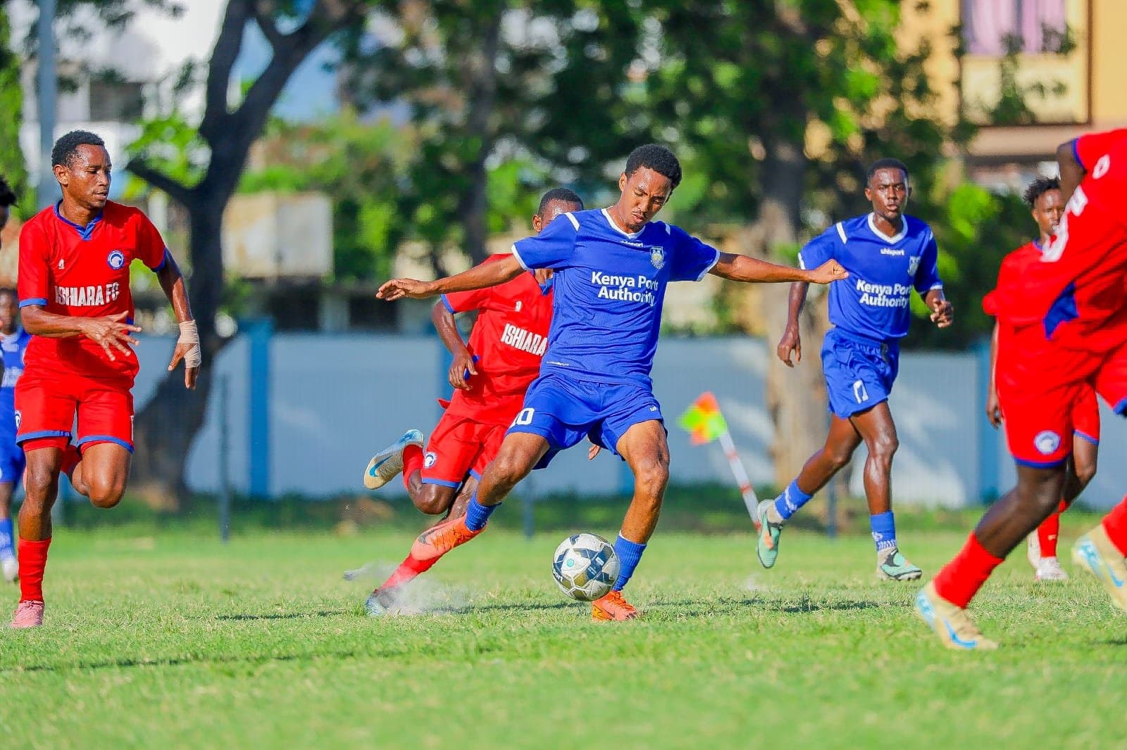 Bandari FC players in a huddle before the match